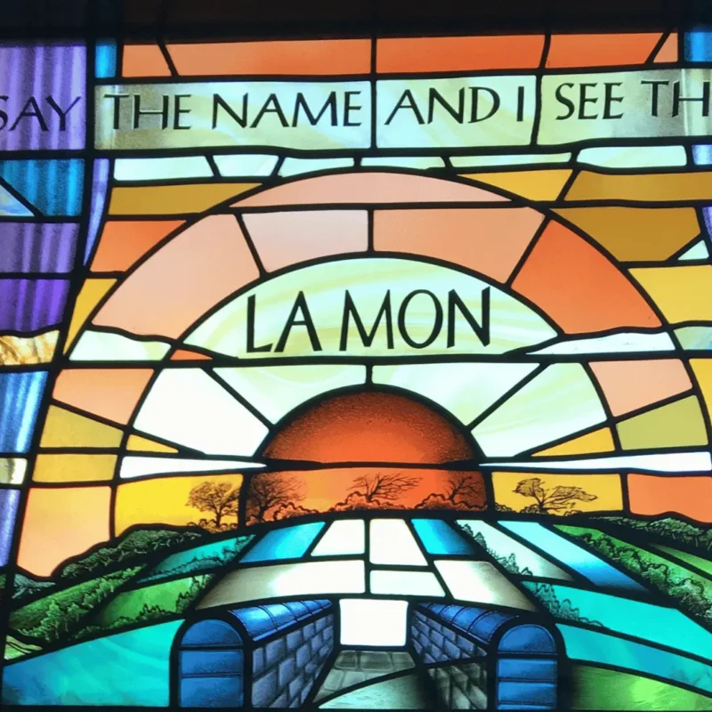 Stained Glass Church Window with the words "You say the name and I see the place"